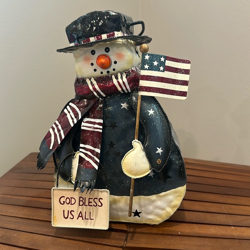 Home Interiors patriotic tin snowman, holds a tea light inserted in door in back